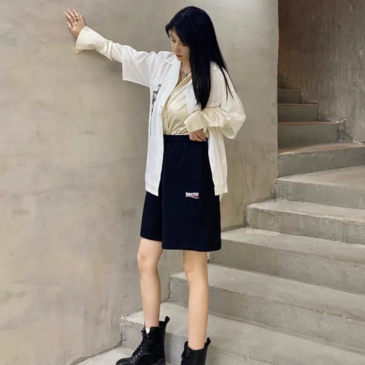 BALENCIAGA巴黎世家POLITICAL CAMPAIGN波浪可樂標字母刺繡短褲五分褲